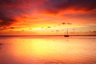 Twilight painted the summer sky scarlet red after the sunset in Bonaire, Dutch Caribbean.