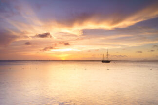 As the sun dissappeared under the horizon, the sky changed its colors to pastel purple and orange in Bonaire, Dutch Caribbean.