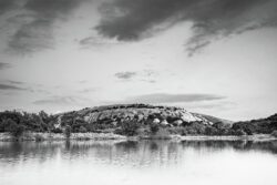 A View of Enchanted Rock from Moss Lake in Black and White | Texas